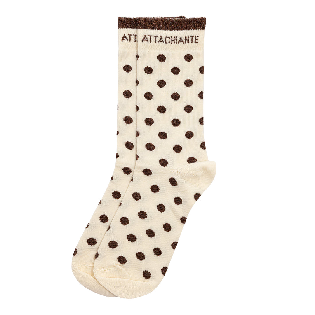 Chaussettes hautes féminines avec mot "ATTACHIANTE"