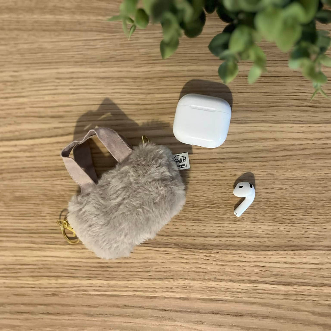 étui pour écouteurs fausse fourrure beige